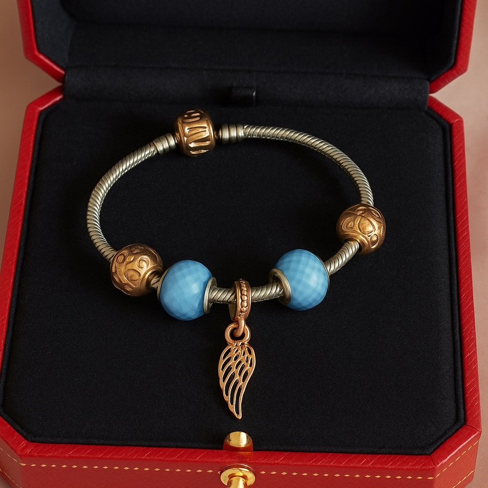 Pandora Gold and Blue Wing Charm Bracelet